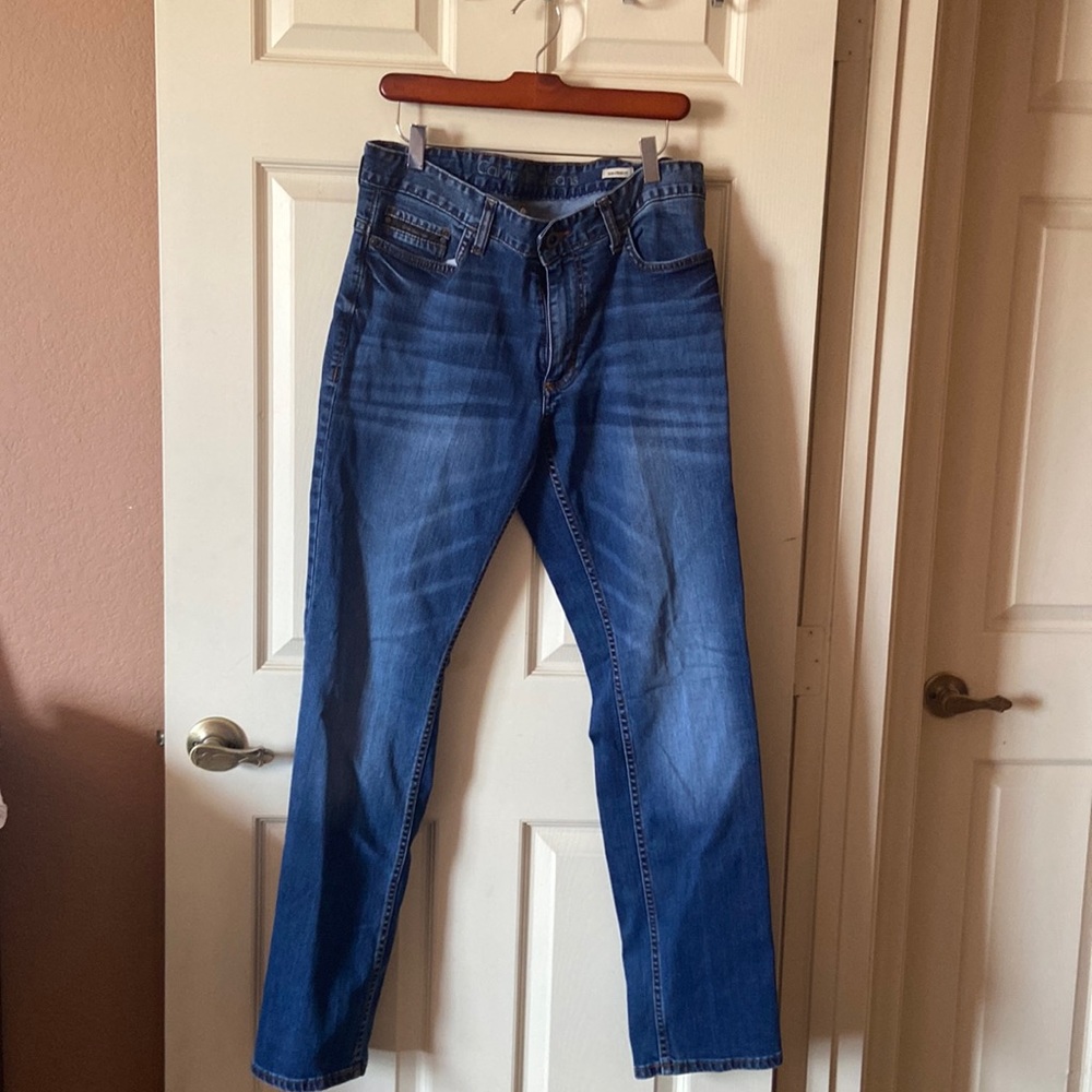 Barely worn mens Calvin Klein blue Jeans, slim straight size w32xL32.